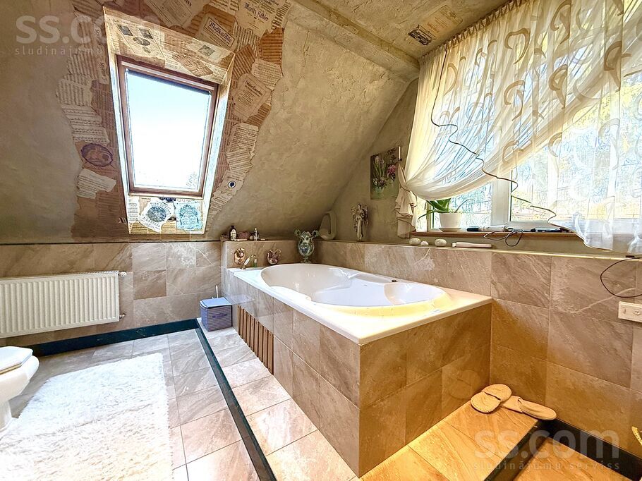 Planīcas 13, Rīga — maja