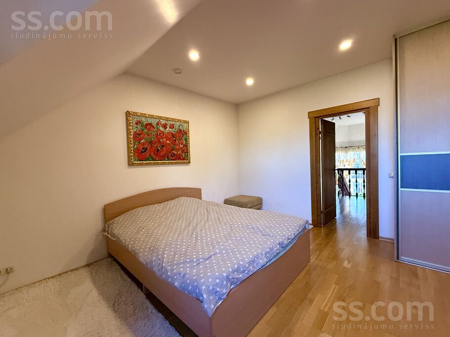 Planīcas 13, Rīga — maja