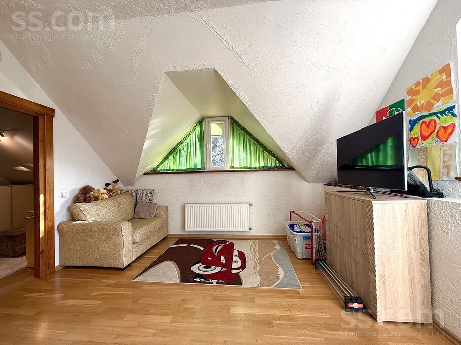 Planīcas 13, Rīga — maja